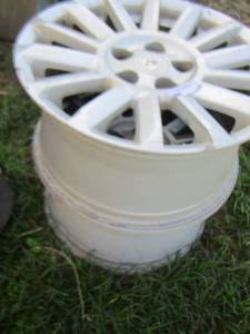 lot 40 image: Cadillac rims qty 2