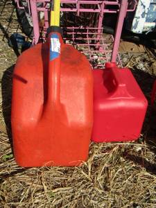 lot 73 image: Red gas cans qty 2 used