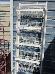 lot 77 image: White display shelf with 6 tier spacing