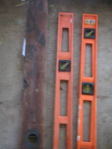 lot 109 image: 2 small orange levels and 1 wooden level