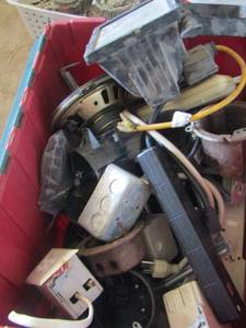 lot 114 image: tub full of extension cords, outlet plugs, shop light, electrical components