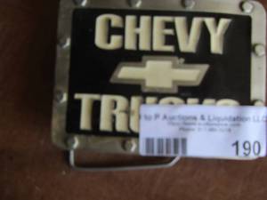 lot 190 image: Chevy truck belt buckle patent # 6.260.874