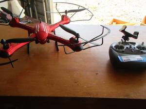 lot 100 image: Red Drone comes with remote unknown working condition