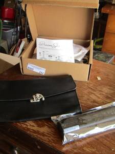 lot 244 image: notebook battery, womens purse, dream spa rainfall showerhead