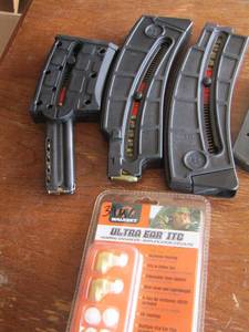 lot 251 image: ultra ear plugs and various gun clips