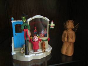 lot 83 image: Merry Christmas store front praying angel