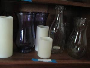 lot 101 image: Clear glass and purple vases- juice bottle by - Hand Arbeit made in Switzerland