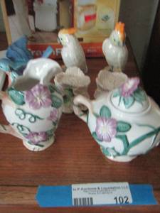 lot 102 image: Fits & Floyd Salt and pepper shaker sets qty 3 , 1 set of cream and sugar