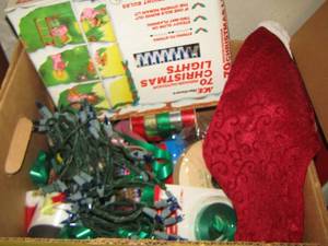 lot 110 image: Christmas lights Christmas ribbon , can of fake snow and more