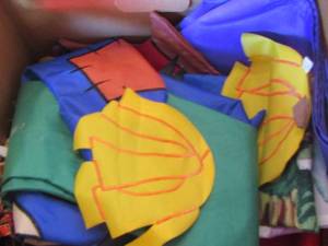lot 126 image: tub of yard flags, spring fall and winter flag poles not included