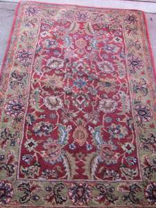 lot 129 image: 65 x 43 burgundy area rug