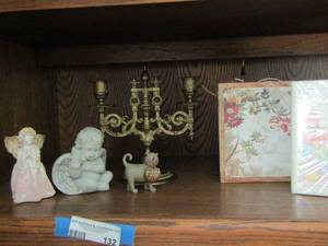 lot 132 image: 2 small photo albums, metal 2 tier candle stand, angles