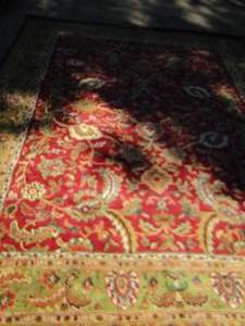lot 143 image: Burgundy area rug   8 12 x 10 12