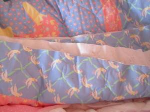 lot 161 image: Tub of fabric, 3 unfinished baby blankets