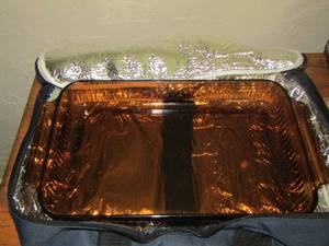 lot 168 image: Anchor Haocking AMBER Glass casserole dish in carry bag