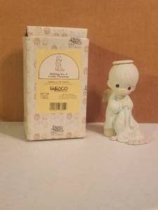 lot 248 image: Precious Moments - 1992 Wishing You a comfy Christmas - 527750
