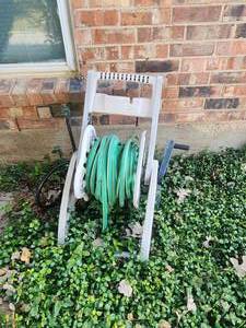 lot 156 image: Hose reel with hose