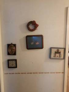 lot 412 image: Selection of wall art and decor in hall