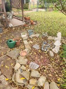 lot 196 image: Selection of yard decor- fountain not included