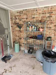 lot 200 image: Shelf and contents along with items on wall