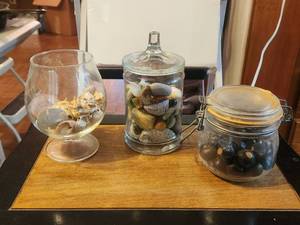 lot 213 image: Selection of glass vessels hold -shells, rocks and buckeye seed pods