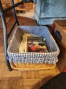lot 309 image: Large 2 handle basket with cookbook and magazines