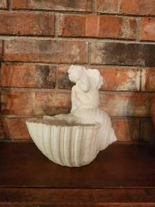 lot 365 image: Cherub sitting on shell home decor