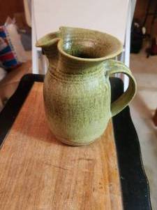 lot 328 image: Vintage green stoneware pitcher