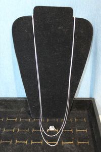 lot 3 image: Two (2) Silver Rope Necklaces and a Beautiful Silver Ring Size 7 Stamped 925