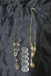 lot 42 image: Two (2) Vintage Avon Necklaces and a Black Stretch Bracelet