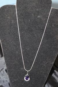 lot 19 image: Necklace 26 with Large Pear Shaped Simulated Amethyst and Simulated Diamond Accents Stamped 925