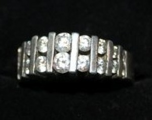 lot 24 image: Size 7 Ring with Simulated Diamonds Stamped 925