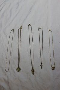 lot 45 image: Five (5) Necklaces most have a Pendant with them