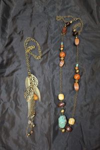 lot 67 image: Vintage Silverstone Cluster Leaf Beaded Dangle Necklace and Vintage Deep Cherry Red Swirl Beads with elated Glass Beads, in Turquoise, Agate Beads and Wooden Beads