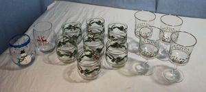 lot 72 image: Holiday Drinkware, Wine Tumblers, seven (7) Matching Vintage Tumblers Holly and Berries, and Four (4) Vintage Holly and Berry Wine Glasses from Arbys