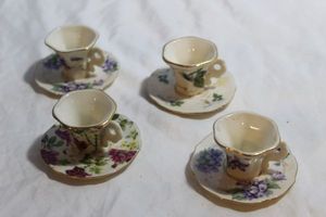lot 79 image: Four (4) Porcelain Tea Cup and Saucer Candle Holders, These are Miniature