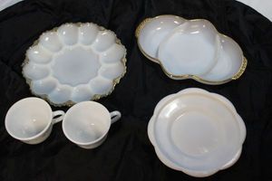lot 106 image: Vintage Gold Rimmed Milk Glass Egg Plate, Divided Relish dish,  as well as a small Plastic Dish and two (2) Pyrex Coffee Cups