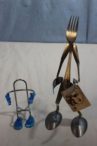 lot 134 image: Fork Art and Cell Phone Stands