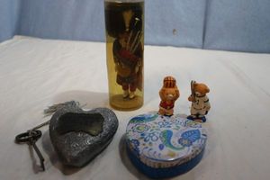 lot 142 image: Vintage Scottish Doll Playing Bag Pipes, Grateful Heart by Democo 1993 Teddy Bear Sports Figurines These are made of Resign and a Heart Shaped Tin