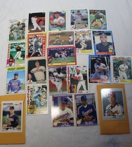 lot 151 image: Collectable Baseball Cards Including Two (2) Signed Cards not Authenticated and One (1) Card has a Cut Error