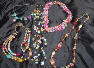 lot 199 image: Four (4) Multi Gemstone and Dyed Shell Necklaces