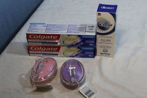 lot 290 image: Three (3) Unopened Tubes of Toothpaste (See Photos for Brands) Two Scalp Massagers
