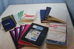 lot 300 image: Binders with Several Packs of Refil Pages. These are 8.5x5.5