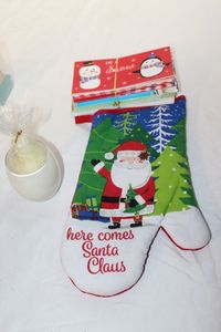 lot 327 image: Christmas Oven Mit, Christmas Cards, White Tree Candle in White Glass Candle Holder