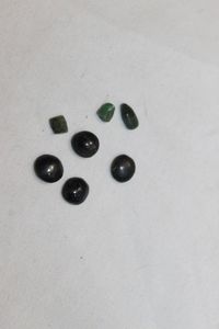 lot 348 image: Natural Stones, Three (3) Tamiz Emeralds and Four (4) Black Star of India