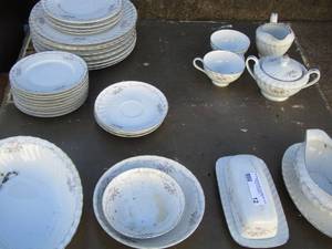 lot 12 image: Gold Standards Porcelain China dishes- creamer sugar butter gravy and soup and salad bowls and dinner plates and cups