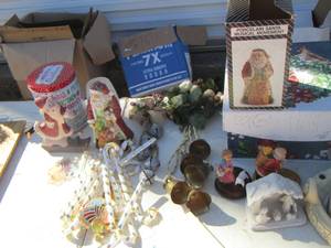 lot 104 image: Large Christmas lot includes, plastic gold and white candy canes, porcelain musical Santa, door bells, and more