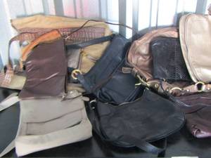 lot 40 image: Lot of small and large womens hand bags and purses