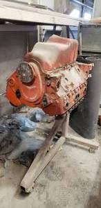 lot 185 image: 1961 Corvette Engine on Rolling Motor Stand