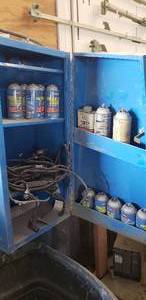 lot 223 image: Contents of Shelf.  Approx 12 R-12 Refrigerant Canisters & More